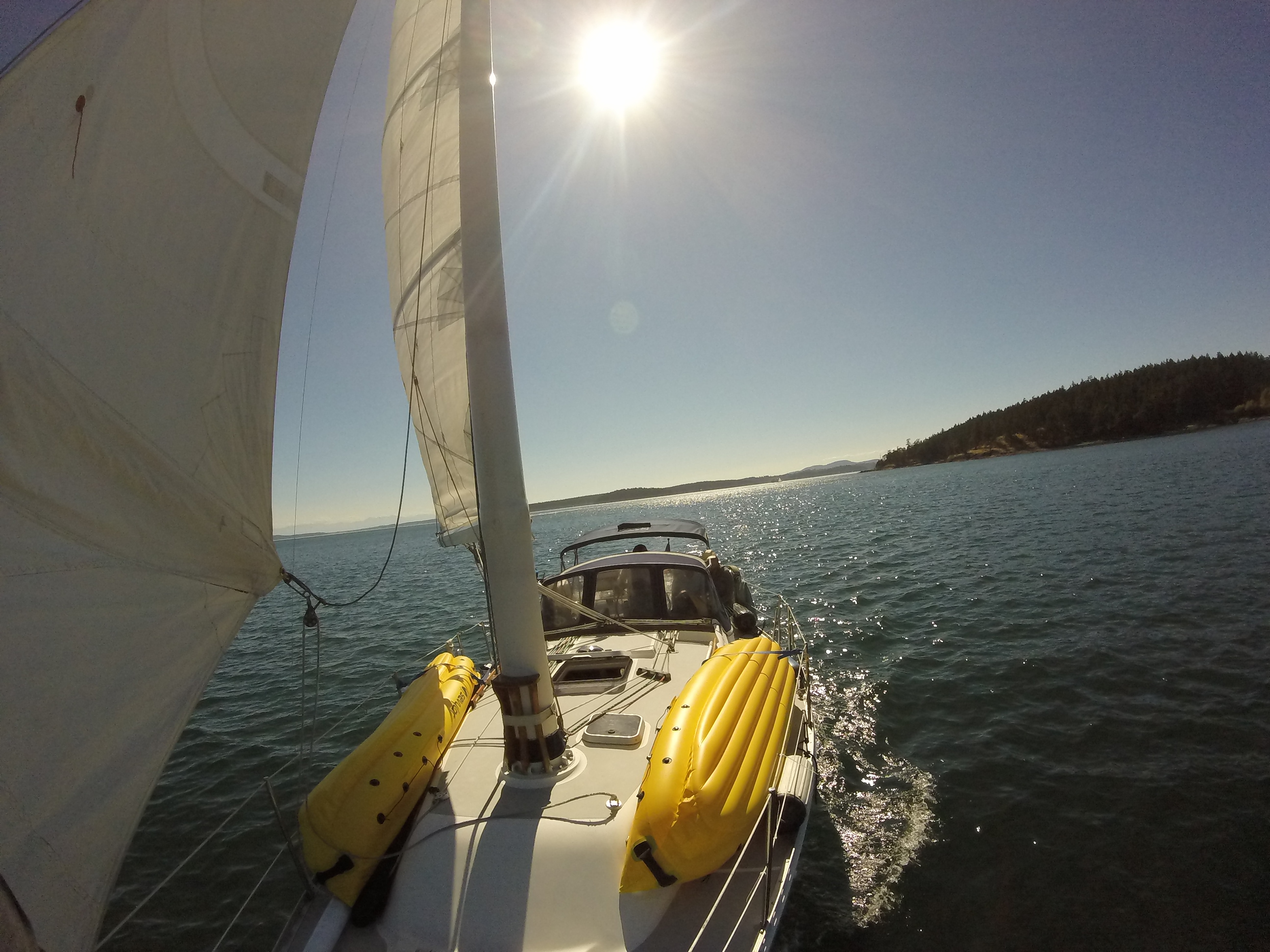 Guests relaxing in the cockpit during a weekend charter.